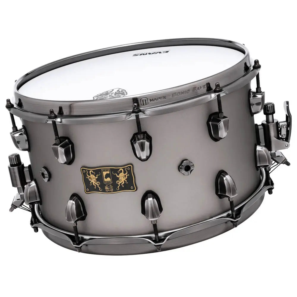 Snare drum with a metallic finish on a white background